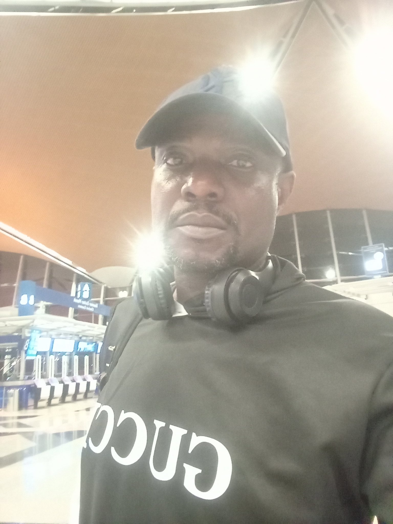 At an airport terminal, check-in counters