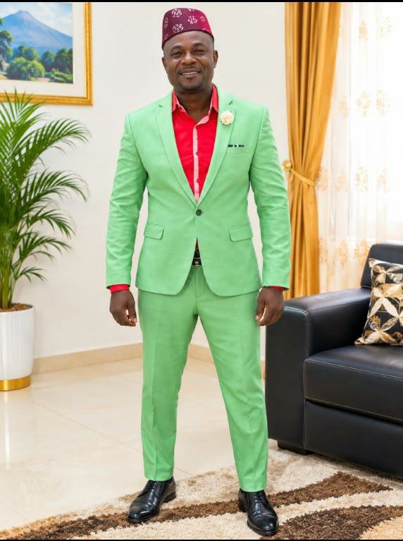 Green suit, red shirt