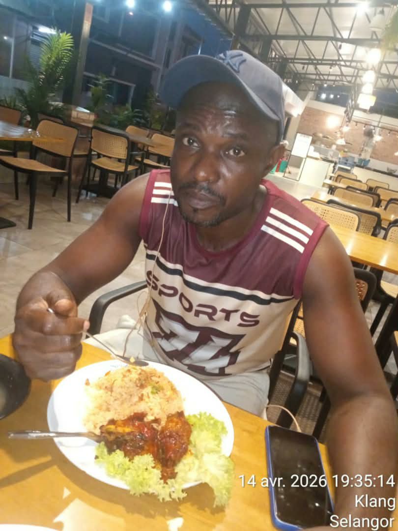 At a restaurant table, eating