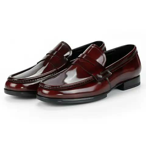 Burgundy patent penny loafers.