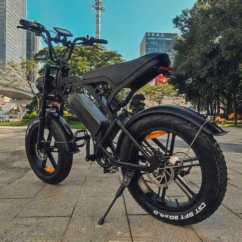 Black fat-tyre electric bike parked outdoors