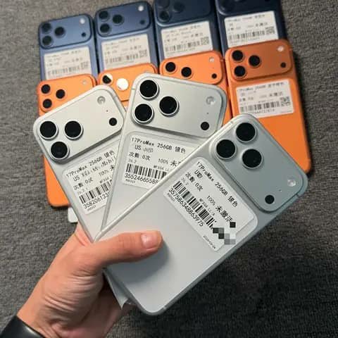iPhone 17 Pro Max backs in silver, orange and blue