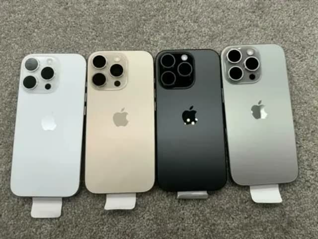Four iPhone Pro backs in white, gold, black and silver