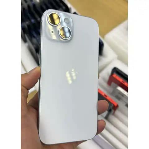 White iPhone, dual camera, held up