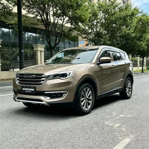 Gold Jetour SUV on a street