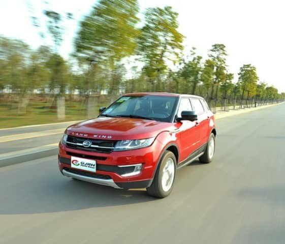 Red Land Wind SUV on a road