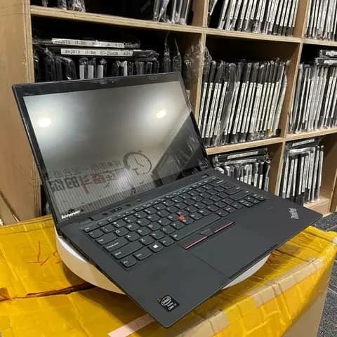 Black Lenovo ThinkPad open in a store