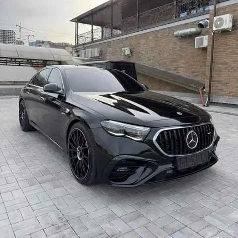 Black Mercedes-Benz sedan parked outdoors