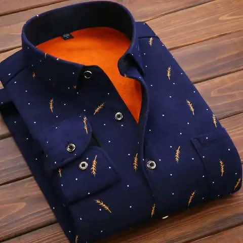 A navy shirt with a wheat-ear print and orange lining.