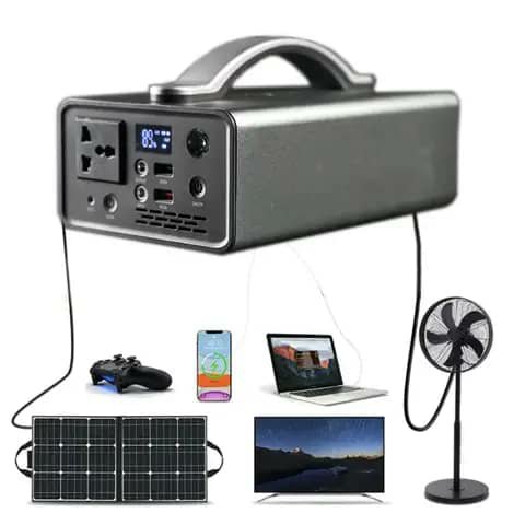 Black portable power station with solar panel, shown with laptop, fan and TV