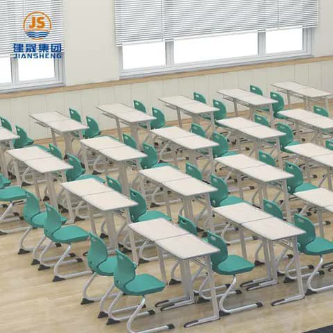 Classroom with green desks and chairs