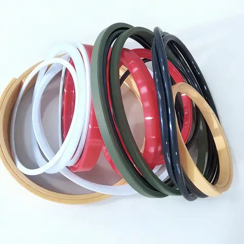 A bundle of seal rings in white, red, green, black and tan.