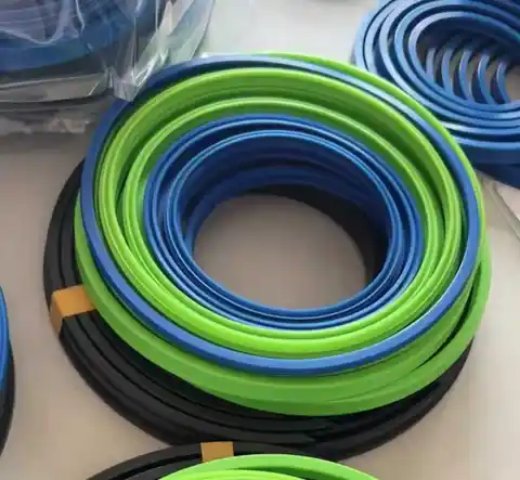 Coils of seal rings in green, blue and black.