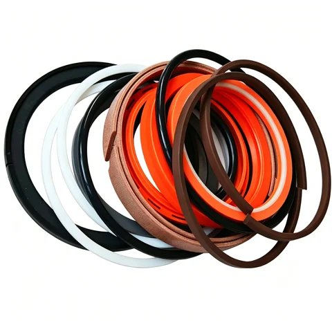 A stack of seal rings in orange, black, white and brown.