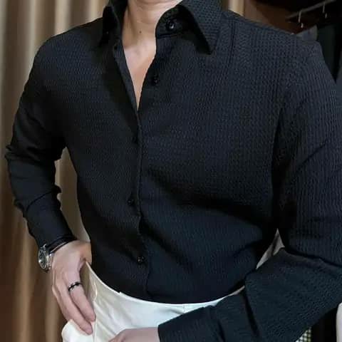 Black textured shirt with white trousers