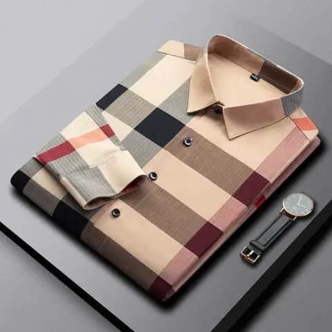 Folded checkered shirt with watch