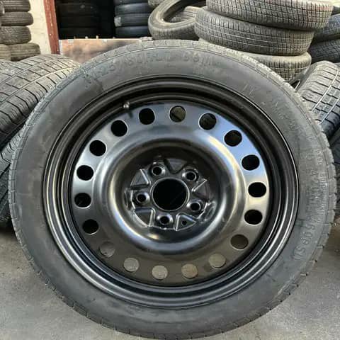 Black steel wheel with tyre