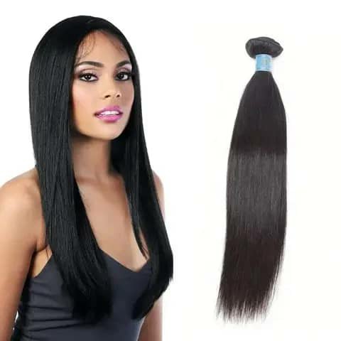 A woman wearing long straight black hair beside a tied bundle of straight black hair.