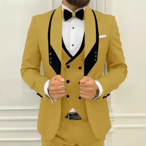 Mustard suit with black lapels and bow tie