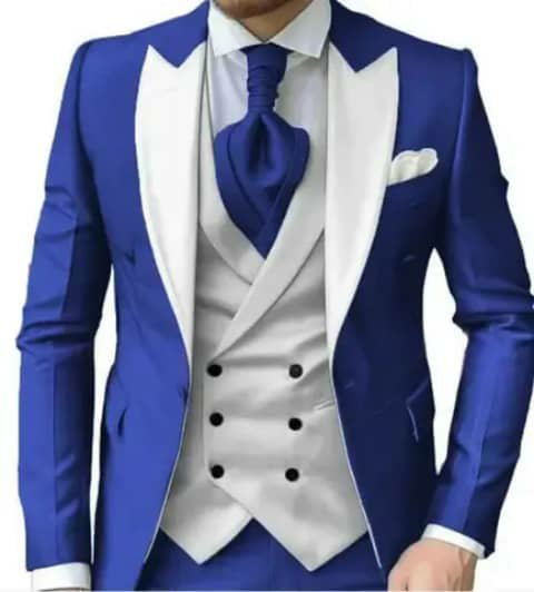 Royal blue suit with white lapels and vest