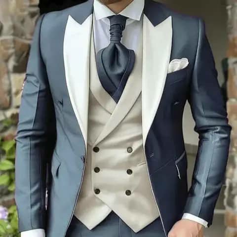 Slate blue suit with ivory lapels and vest