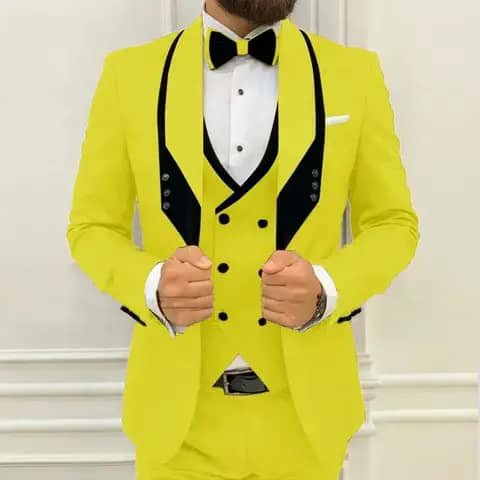Yellow suit with black lapels and bow tie