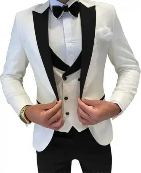 White tuxedo with black lapels and trousers