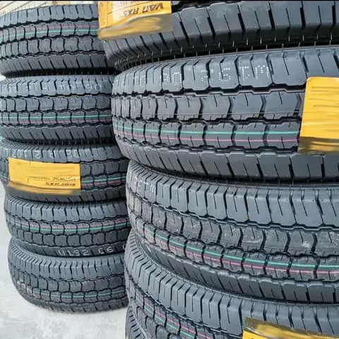 Stacks of van tyres with labels
