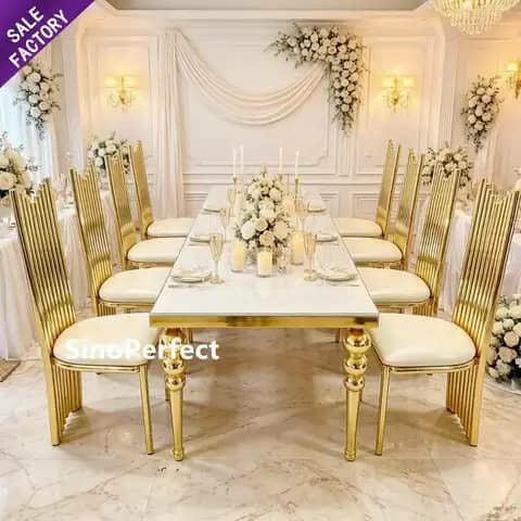 Gold and white dining set at a wedding
