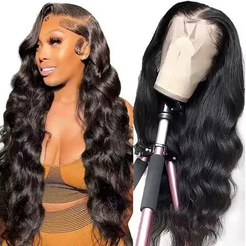 Two views of a long dark wavy wig, worn by a woman and on a mannequin head on a stand.