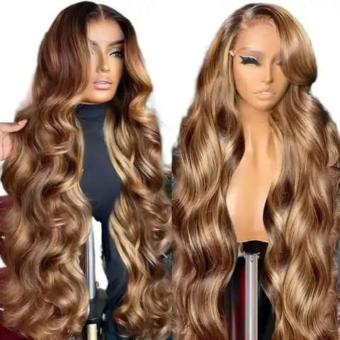 Two long wavy wigs with brown-to-blonde colour on mannequin heads.