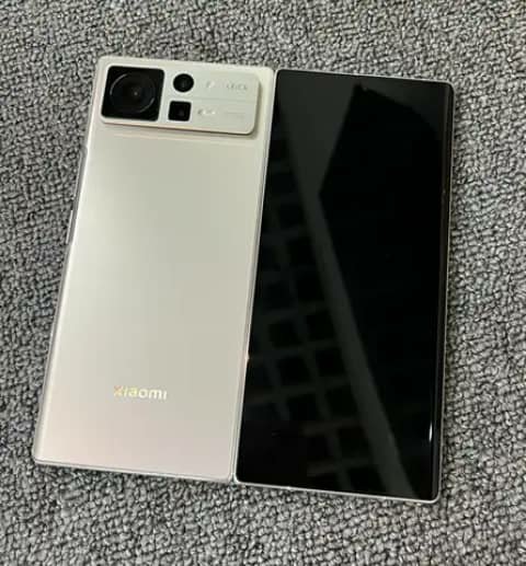 Silver Xiaomi phone, front and back shown